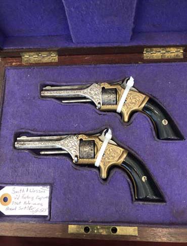 Matching Smith _ Wesson factory engraved pistols $5650